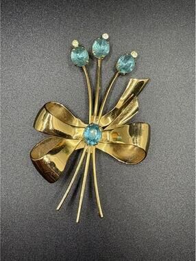 Vintage Gold Tone Coro Blue Rhinestone Bow Brooch